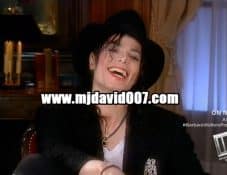 Michael Jackson laughing with Barbara Walters