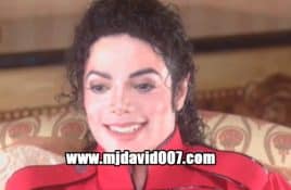 Michael Jackson laughing dressed in red